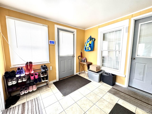 15 Park St, Colebrook, NH 03576 - entryway featuring tile patterned flooring, baseboards, and ornamental molding