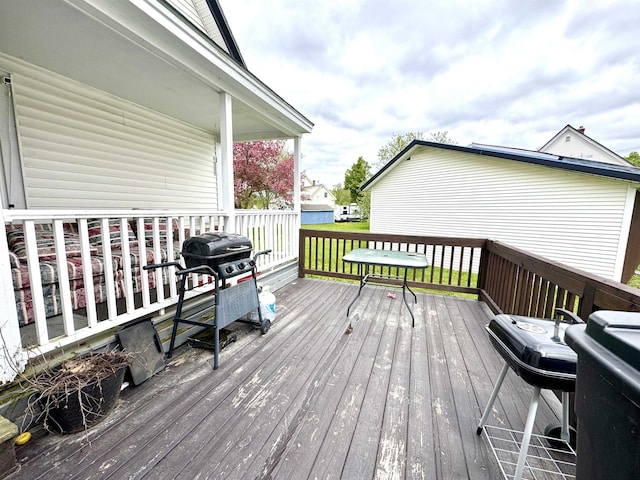 15 Park St, Colebrook, NH 03576 - wooden deck with a grill