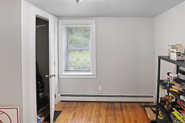 20 Daniel Webster Hwy, Plymouth, NH 03264 - bedroom featuring baseboard heating and hardwood / wood-style floors
