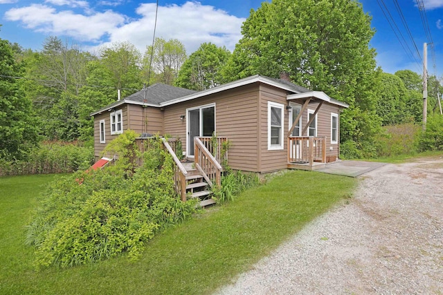 20 Daniel Webster Hwy, Plymouth, NH 03264 - view of front of house featuring a deck and a front yard