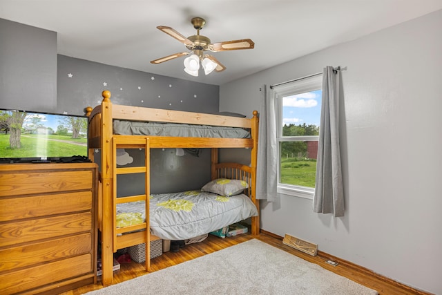 870 Cheesefactory Rd, Shelburne, VT 05482 - bedroom with wood finished floors, baseboards, and ceiling fan
