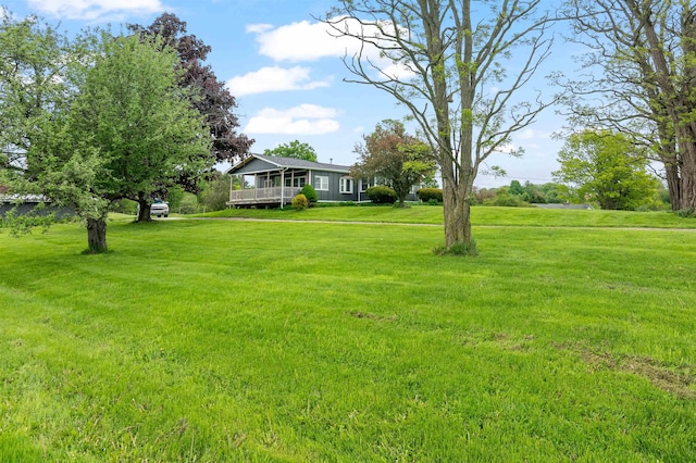 870 Cheesefactory Rd, Shelburne, VT 05482 - view of green lawn featuring a wooden deck