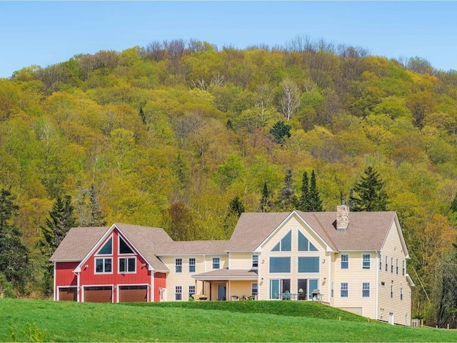 344 Morrie Rd, Washington, VT 05675 - back of house with a forest view and a yard