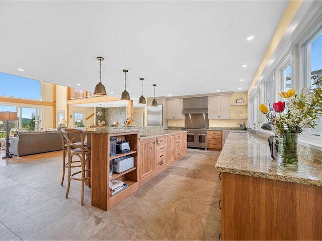 344 Morrie Rd, Washington, VT 05675 - kitchen with open shelves, range with two ovens, wall chimney range hood, light stone countertops, and recessed lighting