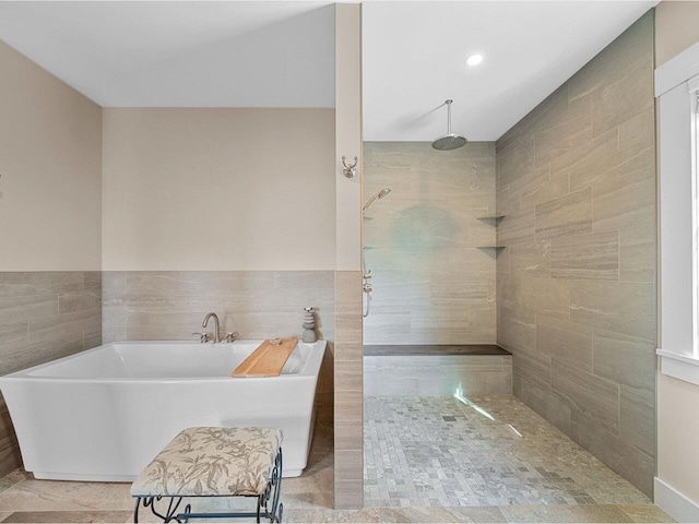 344 Morrie Rd, Washington, VT 05675 - bathroom with walk in shower, a freestanding bath, tile walls, and recessed lighting