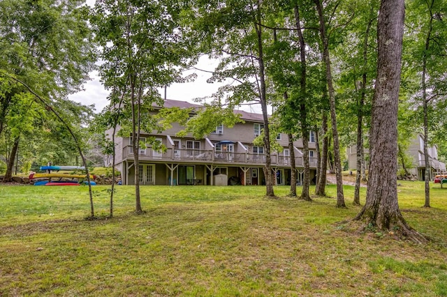 78 Saco Pines Rd Unit 9, Conway, NH 03813 - rear view of property featuring a deck and a yard