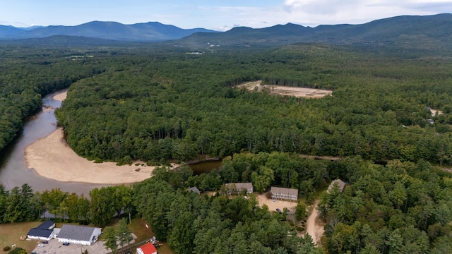 78 Saco Pines Rd Unit 9, Conway, NH 03813 - aerial overview of property's location with a forest and a mountain backdrop