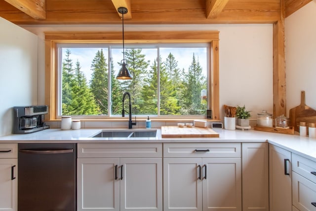 51 Lake View Rd, Westmore, VT 05822 - kitchen featuring stainless steel dishwasher, a sink, light countertops, and white cabinetry
