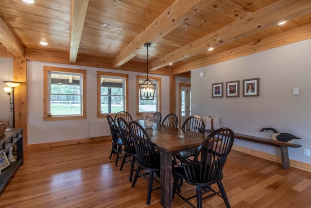 51 Lake View Rd, Westmore, VT 05822 - dining space featuring light wood-style floors, wooden ceiling with exposed beams, baseboards, and radiator