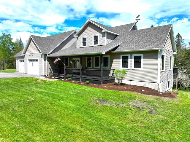 51 Lake View Rd, Westmore, VT 05822 - view of front facade with a porch, roof with shingles, a front lawn, and an attached garage