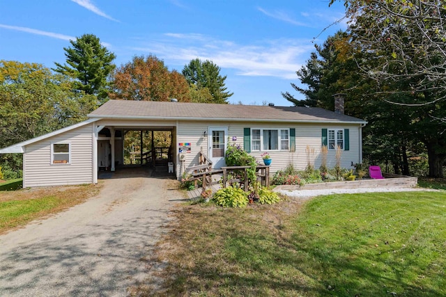71 Scottsdale Rd, Newport City, VT 05855 - single story home featuring a chimney, a front lawn, dirt driveway, and an attached carport
