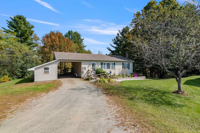 71 Scottsdale Rd, Newport City, VT 05855 - ranch-style home with driveway, a front yard, an attached carport, and a chimney