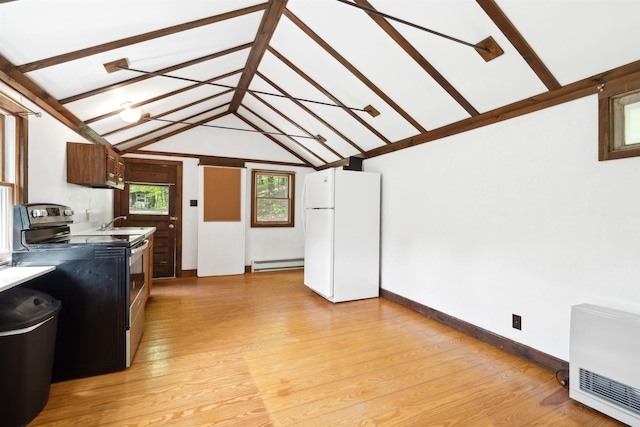 1176 Cross Rd, Strafford, VT 05070 - kitchen with baseboard heating, freestanding refrigerator, stainless steel electric stove, and light wood-style floors
