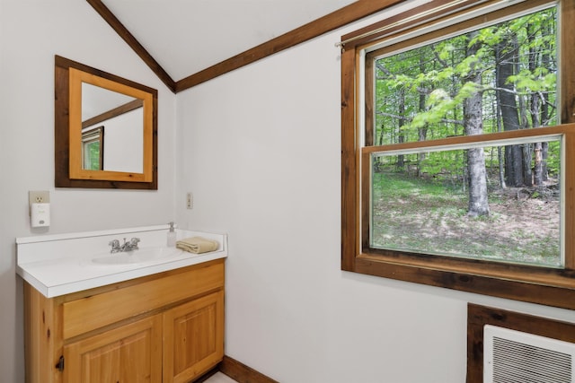 1176 Cross Rd, Strafford, VT 05070 - bathroom featuring vanity and lofted ceiling