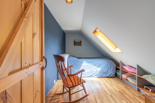 174 Andrews Rd, Holland, VT 05830 - bedroom with lofted ceiling, a skylight, wood finished floors, and recessed lighting