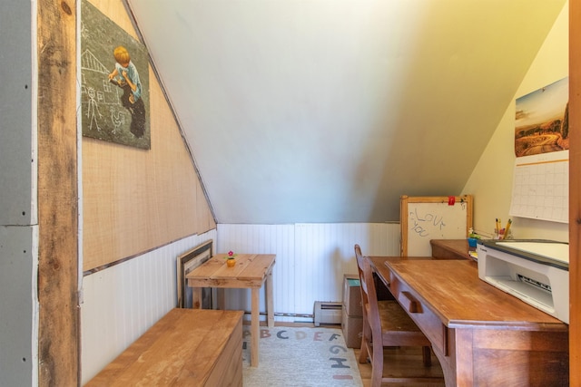 174 Andrews Rd, Holland, VT 05830 - dining space with baseboard heating, lofted ceiling, and wainscoting