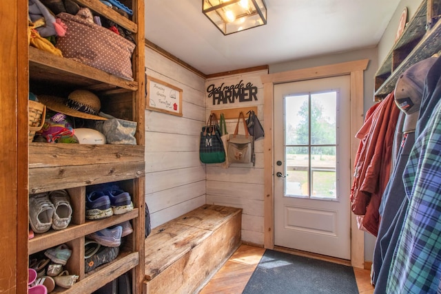 174 Andrews Rd, Holland, VT 05830 - mudroom featuring wooden walls and wood finished floors