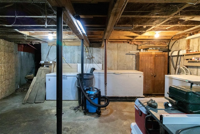 174 Andrews Rd, Holland, VT 05830 - unfinished basement featuring refrigerator