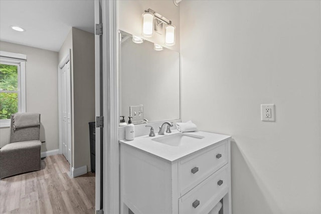 109 Mountainside Dr Unit G202, Stowe, VT 05672 - bathroom featuring vanity, wood finished floors, baseboards, and recessed lighting