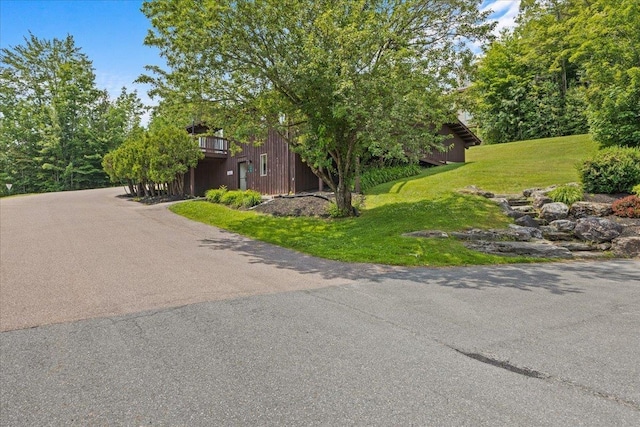 109 Mountainside Dr Unit G202, Stowe, VT 05672 - view of side of home featuring a lawn