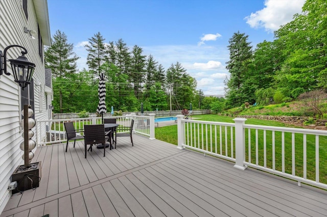 2 Cortland Rd, Milford, NH 03055 - wooden deck with view of wooded area and outdoor dining area