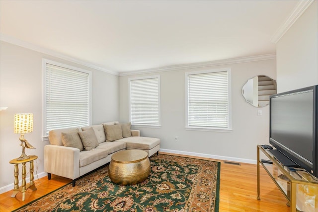 2 Cortland Rd, Milford, NH 03055 - living area with crown molding, light wood-style floors, and baseboards