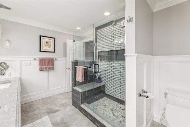 2 Cortland Rd, Milford, NH 03055 - bathroom featuring a decorative wall, ornamental molding, wainscoting, a stall shower, and toilet