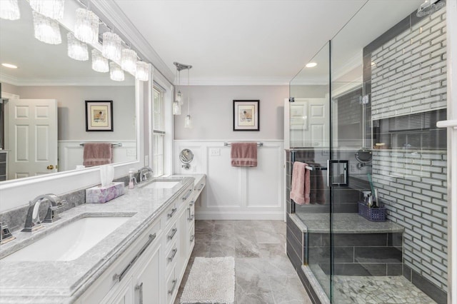 2 Cortland Rd, Milford, NH 03055 - full bathroom with double vanity, a decorative wall, ornamental molding, a wainscoted wall, and recessed lighting