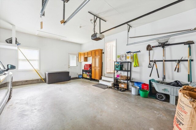 2 Cortland Rd, Milford, NH 03055 - garage featuring a garage door opener