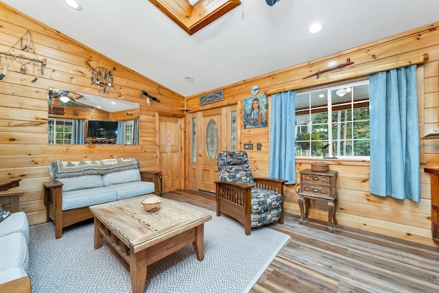 18 Mayflower Ln, Moultonborough, NH 03254 - living room featuring wood walls, vaulted ceiling, wood finished floors, and recessed lighting