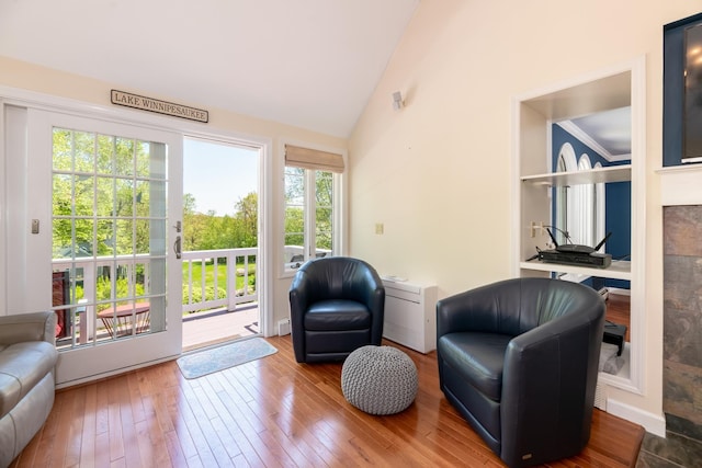 21 Hawk Ridge Rd, Meredith, NH 03253 - sitting room featuring vaulted ceiling and wood-type flooring