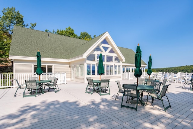 21 Hawk Ridge Rd, Meredith, NH 03253 - wooden terrace with outdoor dining space