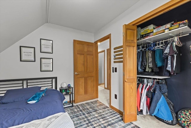 100 Maplewood Ave, Milton, VT 05468 - bedroom featuring a closet, carpet, and lofted ceiling