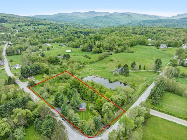1572 Stowe Hollow Rd, Stowe, VT 05672 - aerial overview of property's location with property parcel outlined, a water and mountain view, and a forest