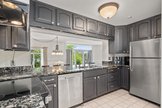 12 Drew Ln, Laconia, NH 03246 - kitchen featuring stainless steel appliances, a sink, light tile patterned floors, and healthy amount of natural light