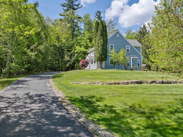 12 Drew Ln, Laconia, NH 03246 - view of front of home with driveway and a front yard