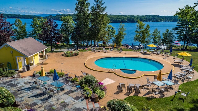 12 Drew Ln, Laconia, NH 03246 - view of swimming pool featuring a water view, a patio area, an outdoor hot tub, and an outdoor structure