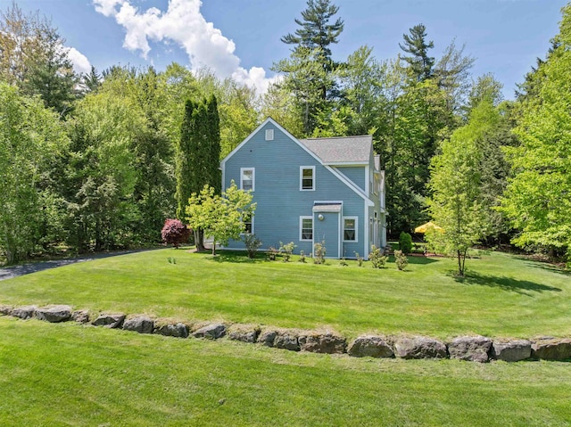 12 Drew Ln, Laconia, NH 03246 - view of property exterior featuring a lawn