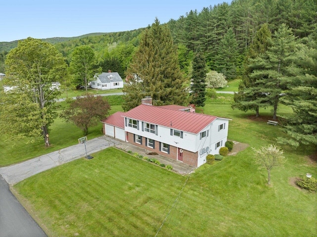 37 Dickinson Dr, Northfield, VT 05664 - aerial view of property and surrounding area featuring a forest