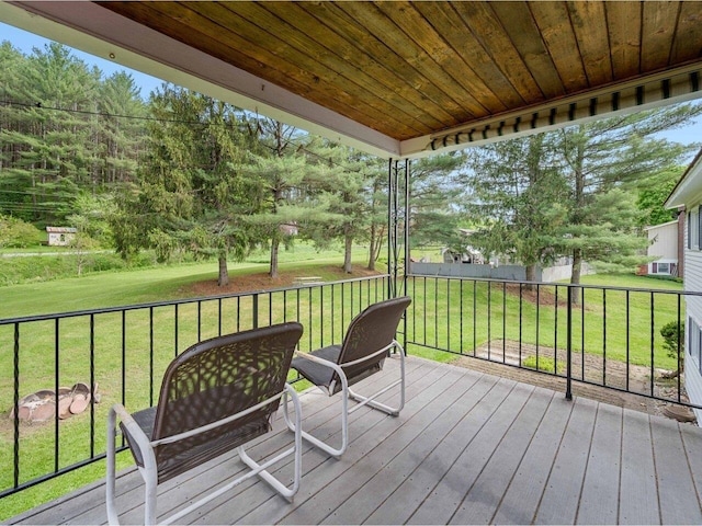 37 Dickinson Dr, Northfield, VT 05664 - wooden deck featuring a lawn