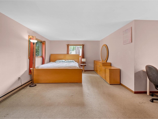 37 Dickinson Dr, Northfield, VT 05664 - carpeted bedroom with baseboards and a baseboard heating unit