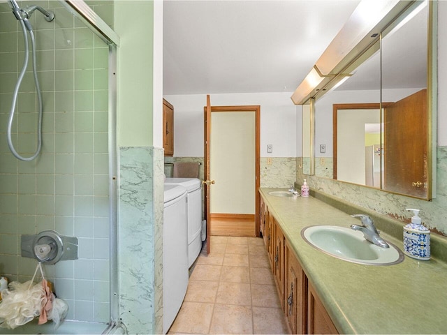 37 Dickinson Dr, Northfield, VT 05664 - full bath featuring washing machine and clothes dryer, a stall shower, double vanity, and tile patterned flooring