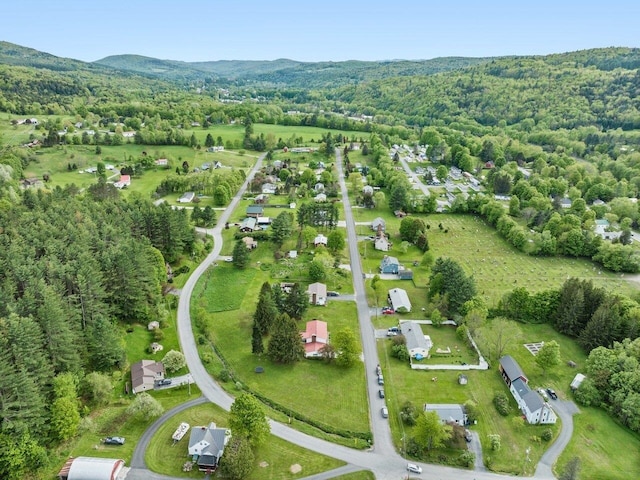 37 Dickinson Dr, Northfield, VT 05664 - aerial view of property's location featuring a heavily wooded area and a mountainous background