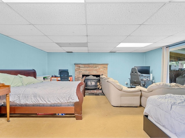 37 Dickinson Dr, Northfield, VT 05664 - bedroom featuring carpet floors, a wood stove, and a drop ceiling
