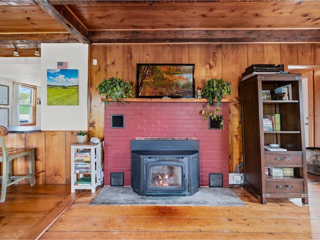 183 Morrie Rd, Washington, VT 05675 - living area featuring wooden ceiling with exposed beams, hardwood / wood-style floors, wood walls, and a wainscoted wall
