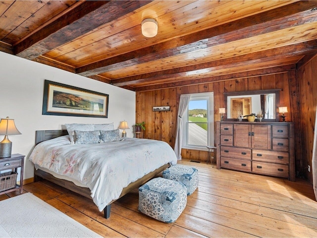 183 Morrie Rd, Washington, VT 05675 - bedroom with wooden ceiling with exposed beams, light wood finished floors, and wooden walls