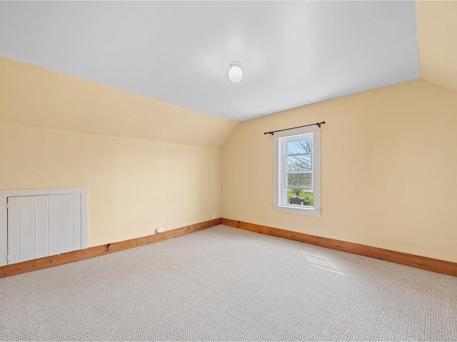 183 Morrie Rd, Washington, VT 05675 - additional living space with lofted ceiling, carpet flooring, and baseboards