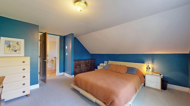825 S End Rd, North Hero, VT 05457 - carpeted bedroom featuring baseboards and lofted ceiling