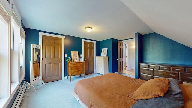 825 S End Rd, North Hero, VT 05457 - bedroom featuring light colored carpet, baseboard heating, and lofted ceiling