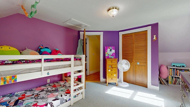825 S End Rd, North Hero, VT 05457 - carpeted bedroom with lofted ceiling, a closet, and attic access